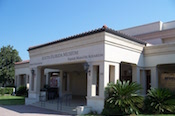 white pillars and cycads at entrance to South Florida Museum