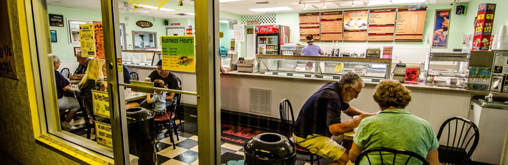 customers enjoying ice cream in Tyler's Ice Cream shop