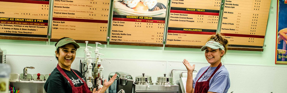 Ice cream shop menu with two female employees